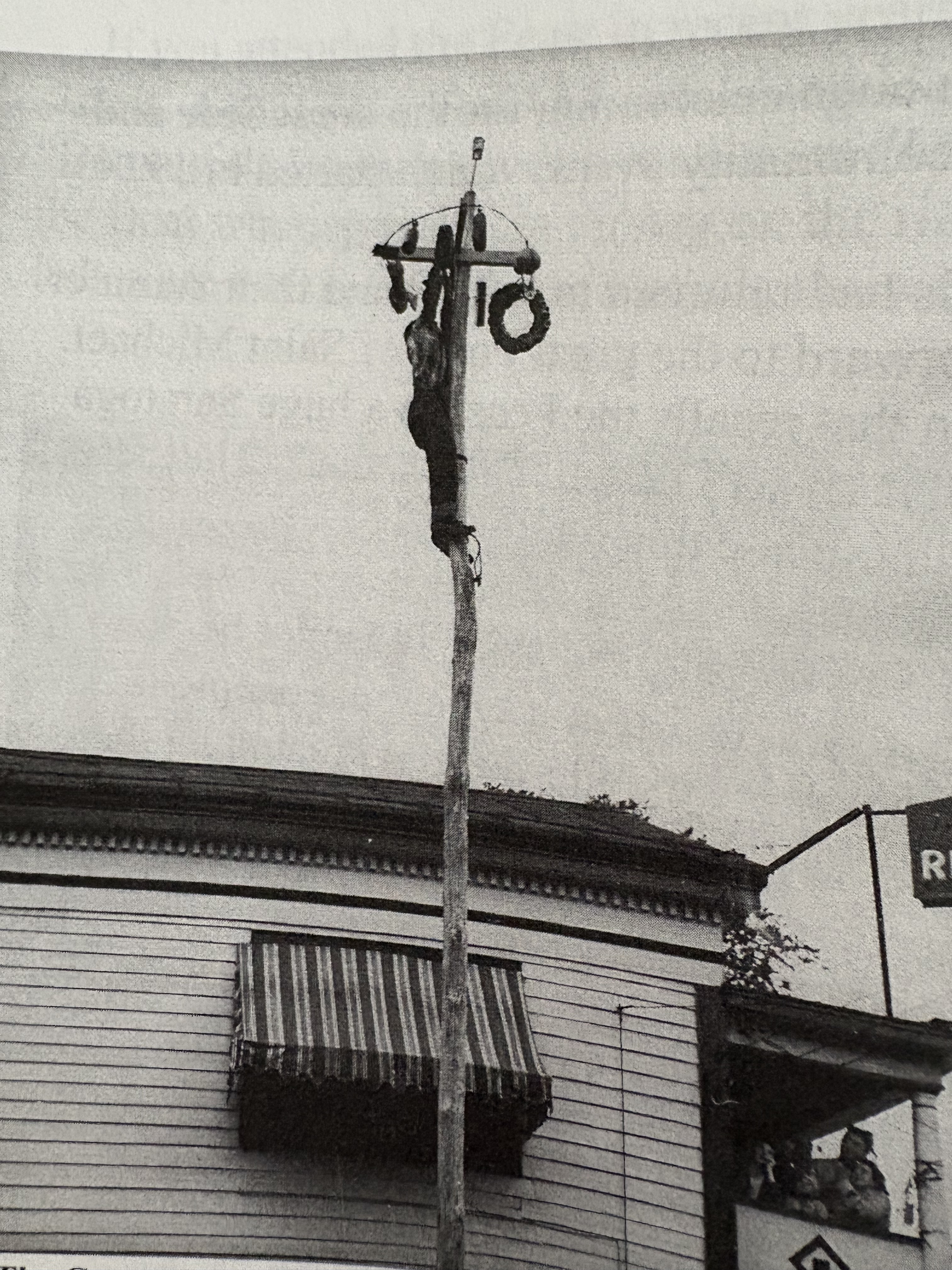 Archival photo of Grease Pole at St. Michael Festival on Beekman Street, Saratoga Springs